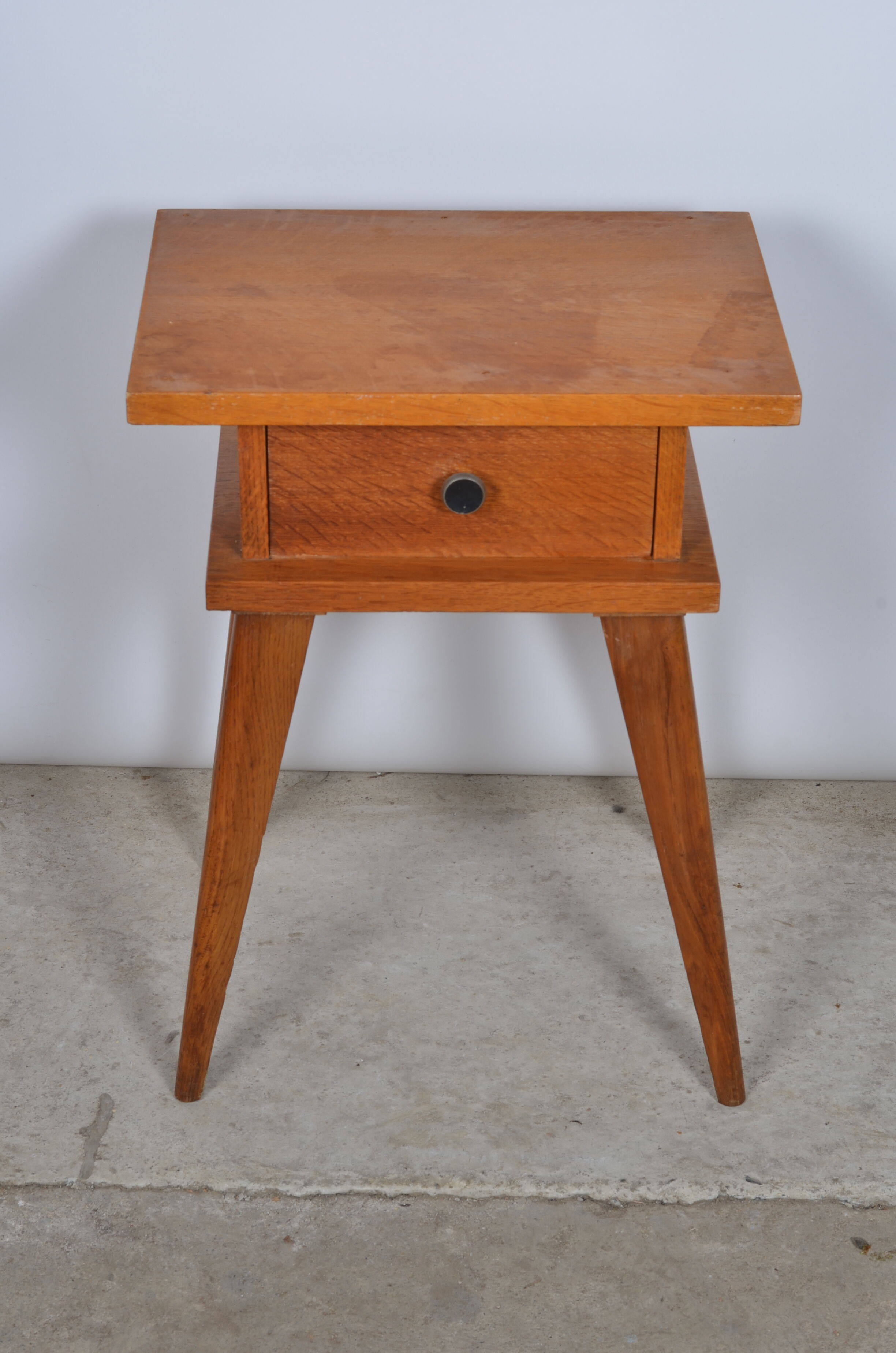 Compass feet bedside table