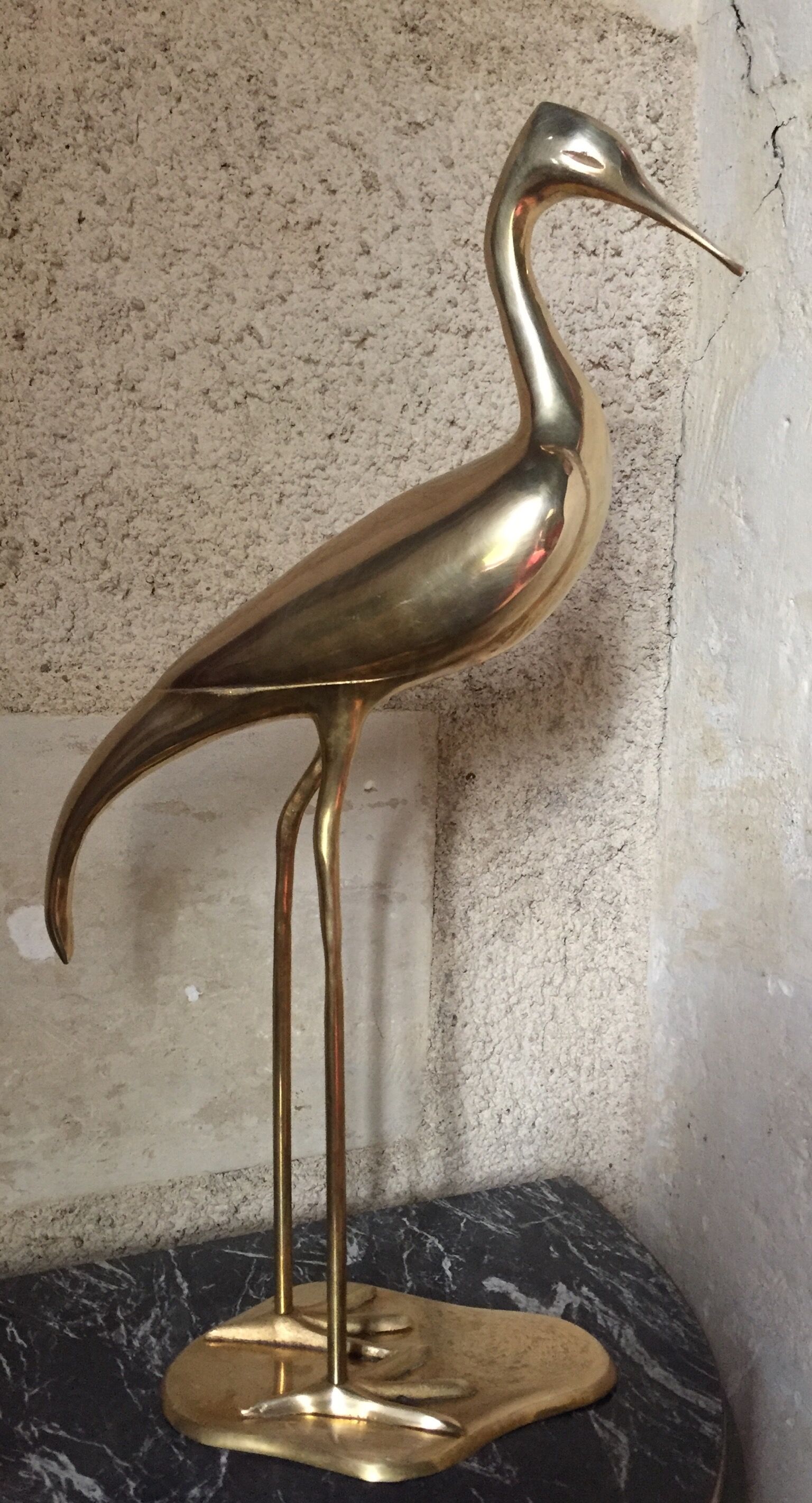 Pair of herons in brass