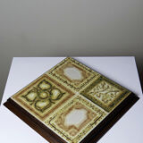 Vintage trivet in glazed ceramic and wood, circa 1960-1970.