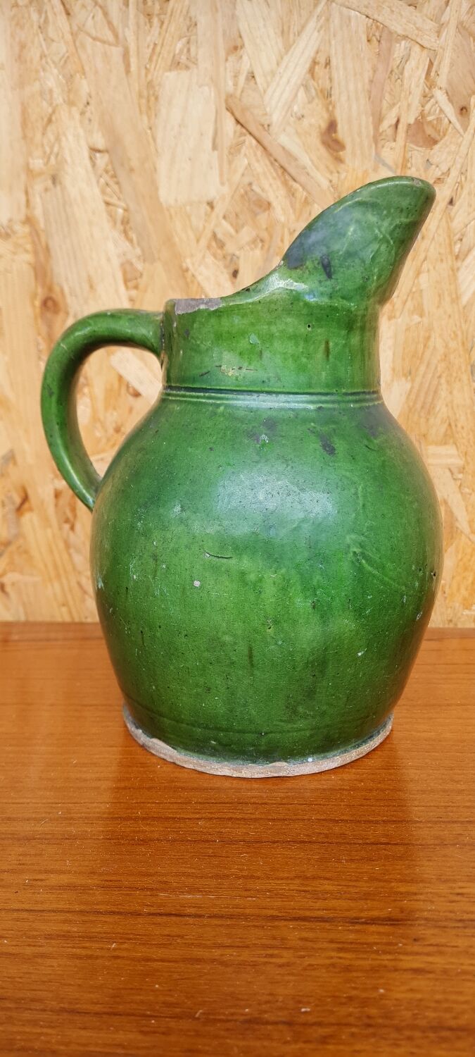 Green varnished stoneware pitcher