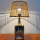 Lampe en verre et rotin