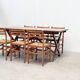 Set of six walnut and rattan dining chairs