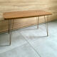 Table basse vintage 1960 Formica teck et pieds laiton