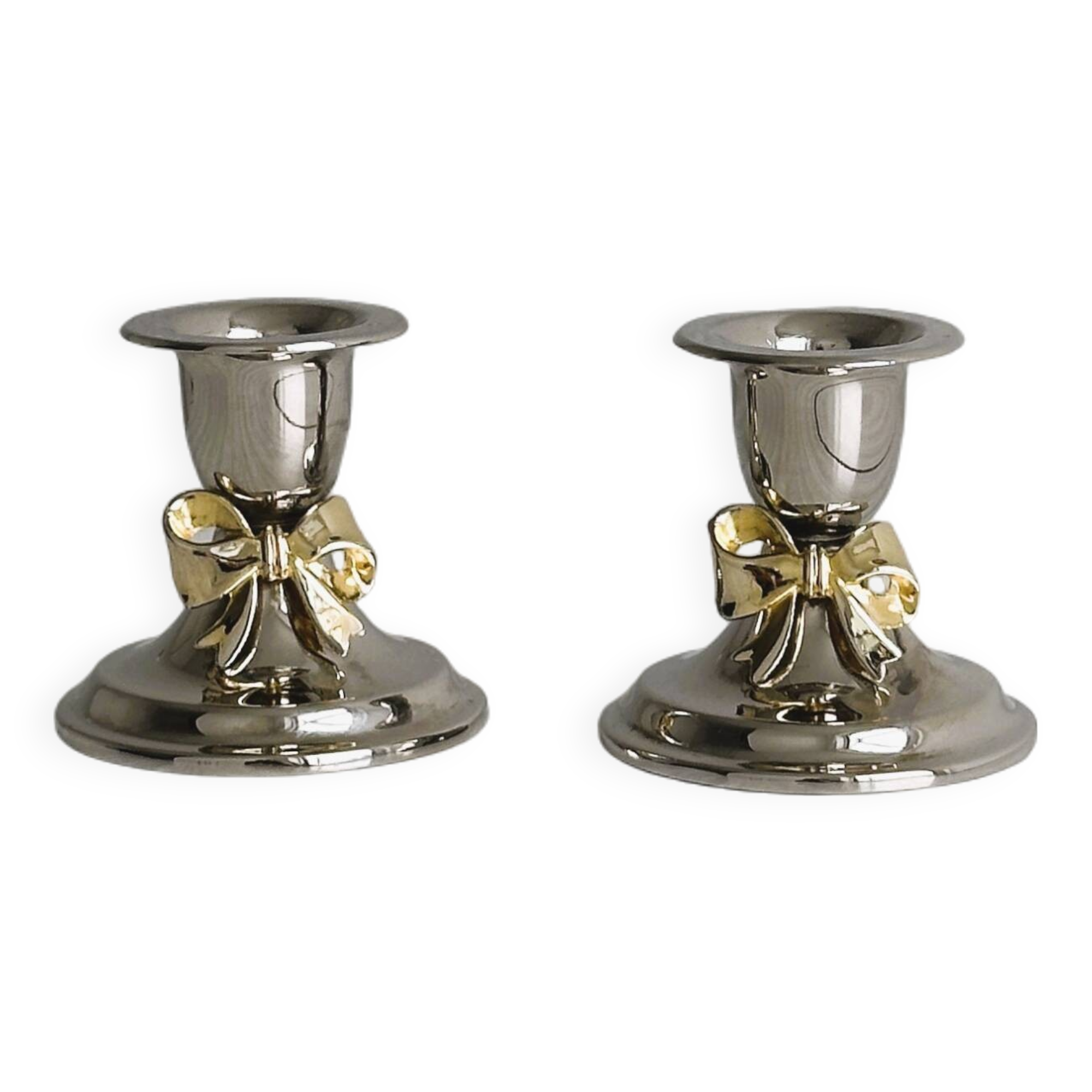 Pair of small antique metal candlesticks