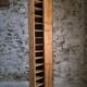 Antique French workshop cabinet in pine with compartments.