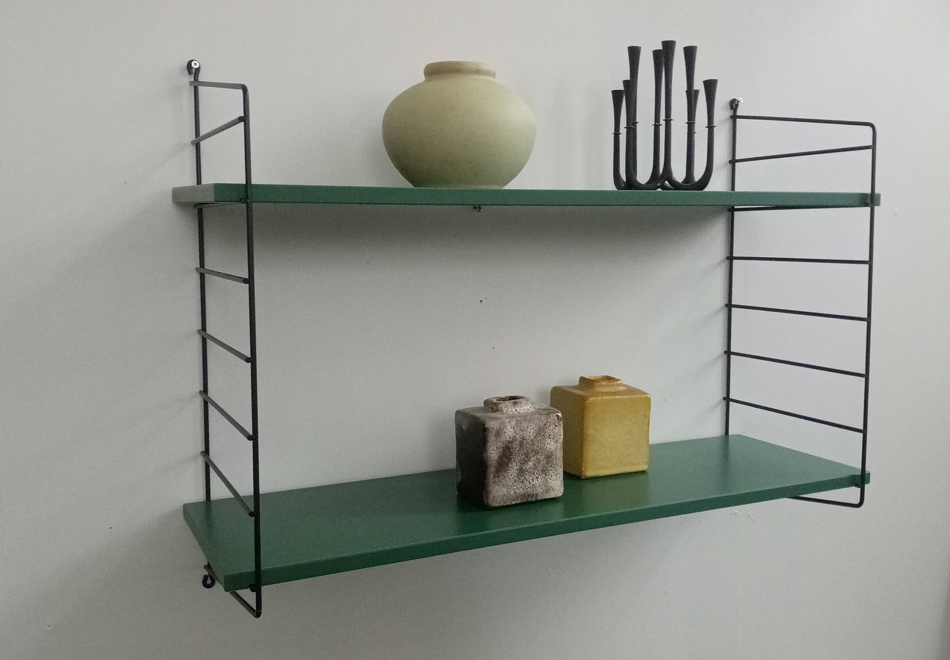 Wall shelf unit in blue from the 70s