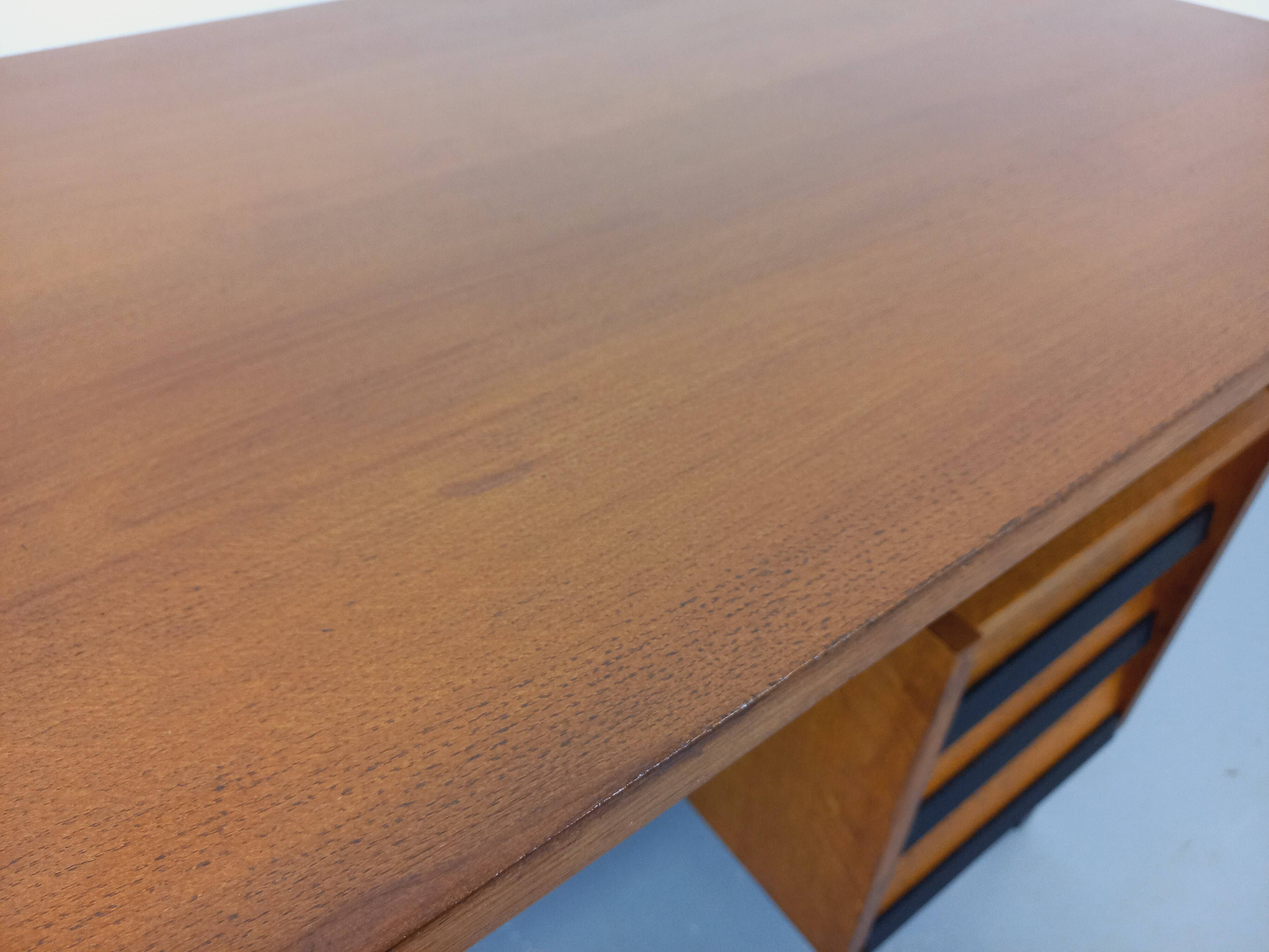 Vintage modernist desk in wood and black metal from the 60s