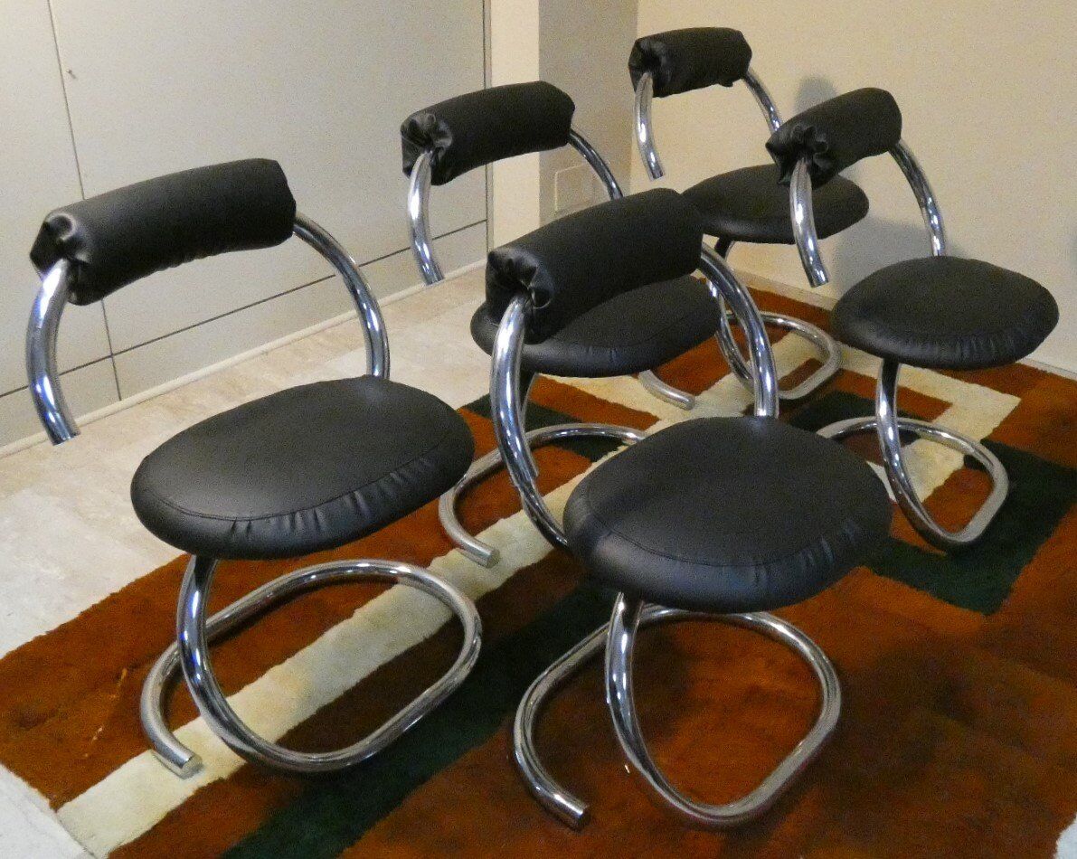 Cobra chairs in steel and black leather by Giotto Stoppino, 1970s, set of 5.