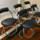 Cobra chairs in steel and black leather by Giotto Stoppino, 1970s, set of 5.