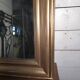 Golden mirror in Louis Philippe style