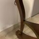 Empire-style tripode healing in mahogany top of marble gallery