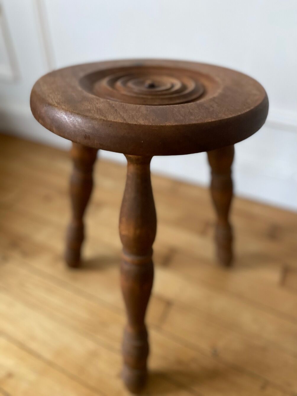 Wooden tripod stool