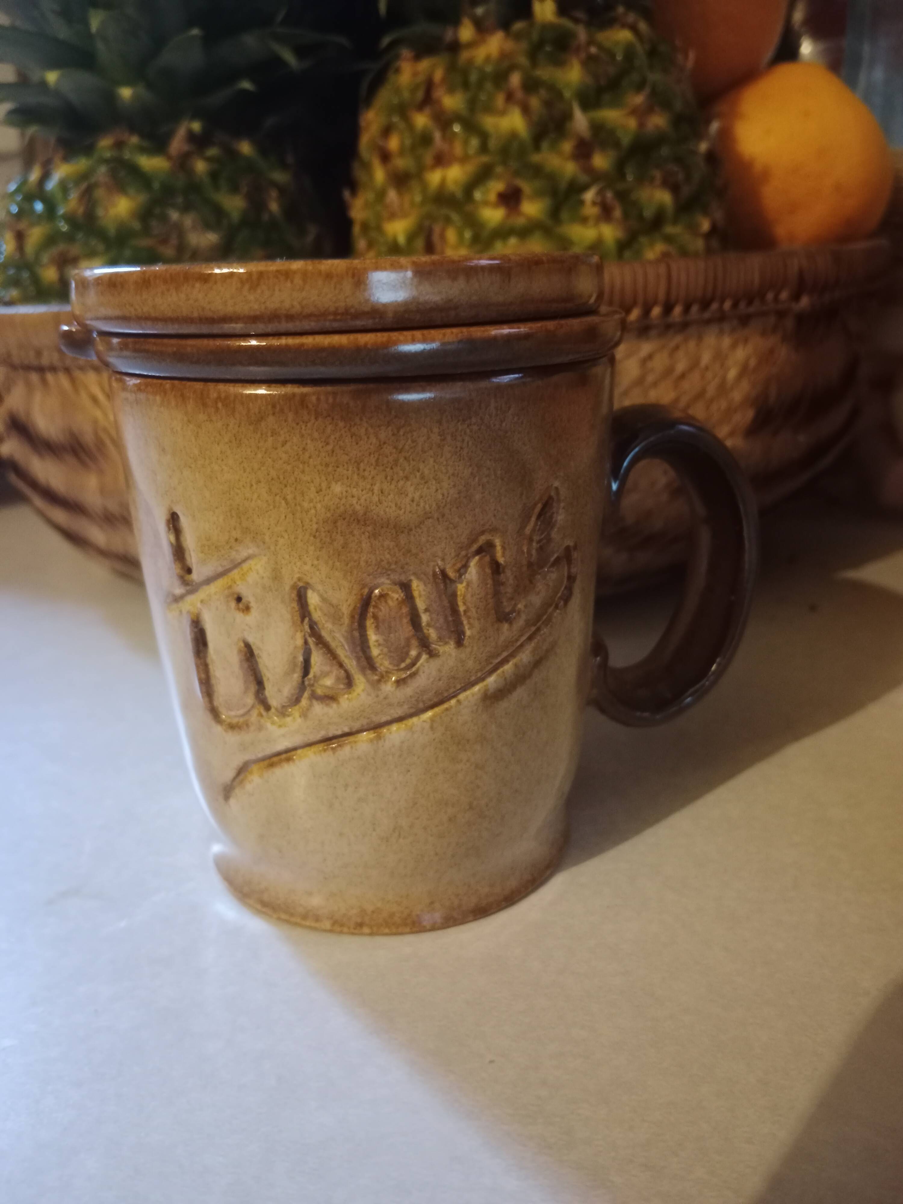 Vintage stoneware herbal tea cup