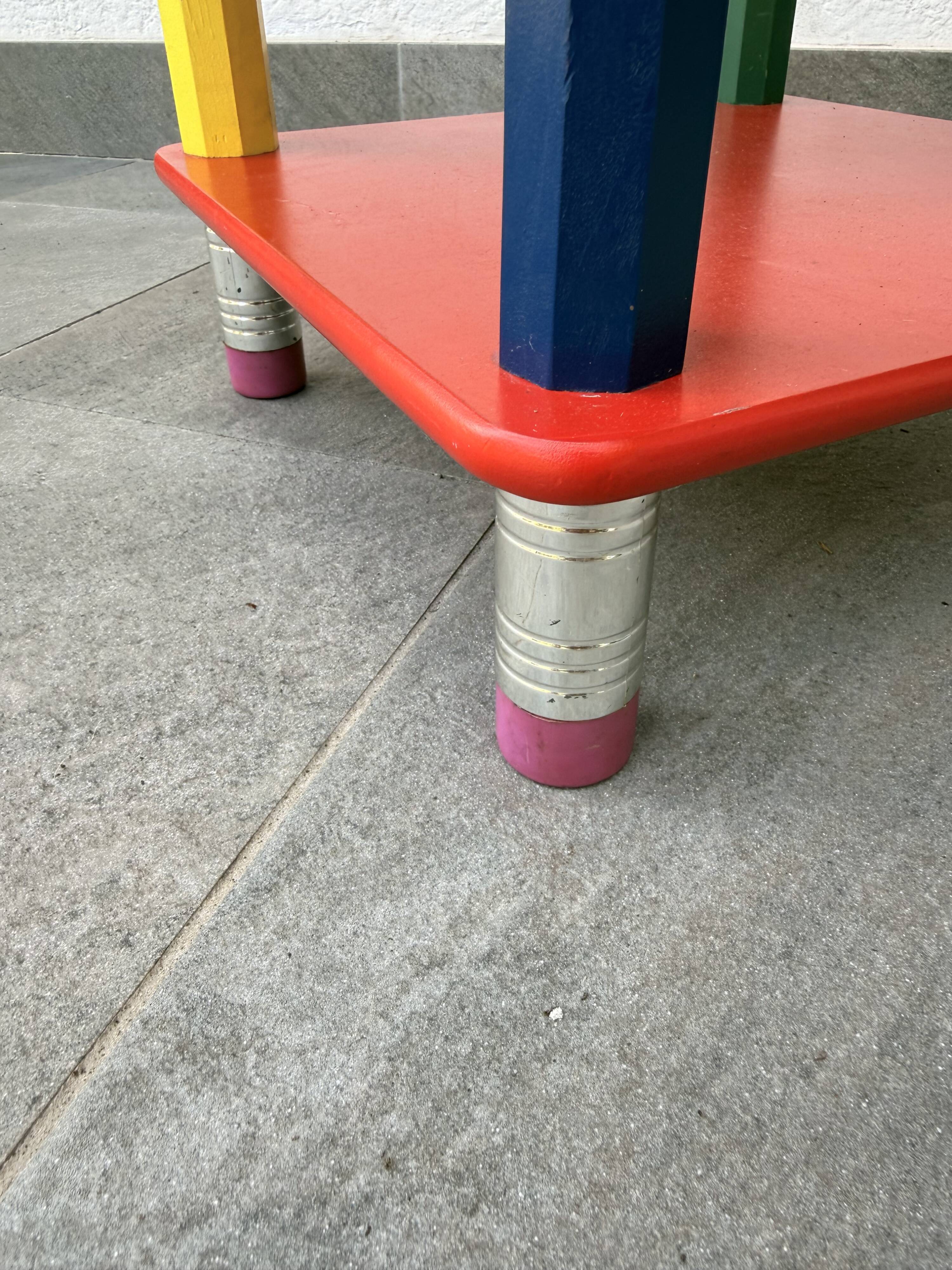 1980s side table with crayons, attributed to Pierre Sala.
