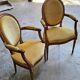 Elegant pair of Louis XVI cabriolet armchairs in moulded wood and upholstered.
