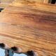 Table basse brutaliste en bois et fer forgé