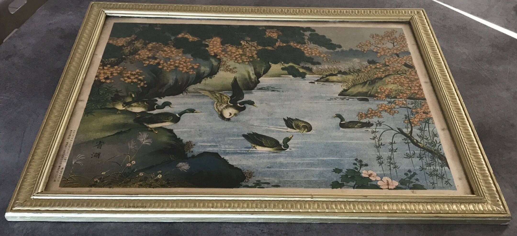 Old painting with a polychrome print decoration of ducks in nature.