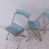 Two folding opera chairs in velvet