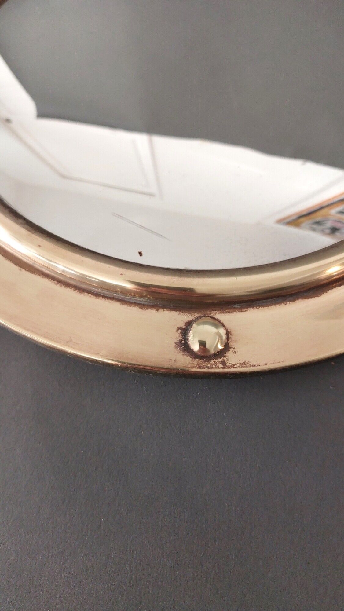 Witch porthole mirror 1940 in vintage gilded brass.