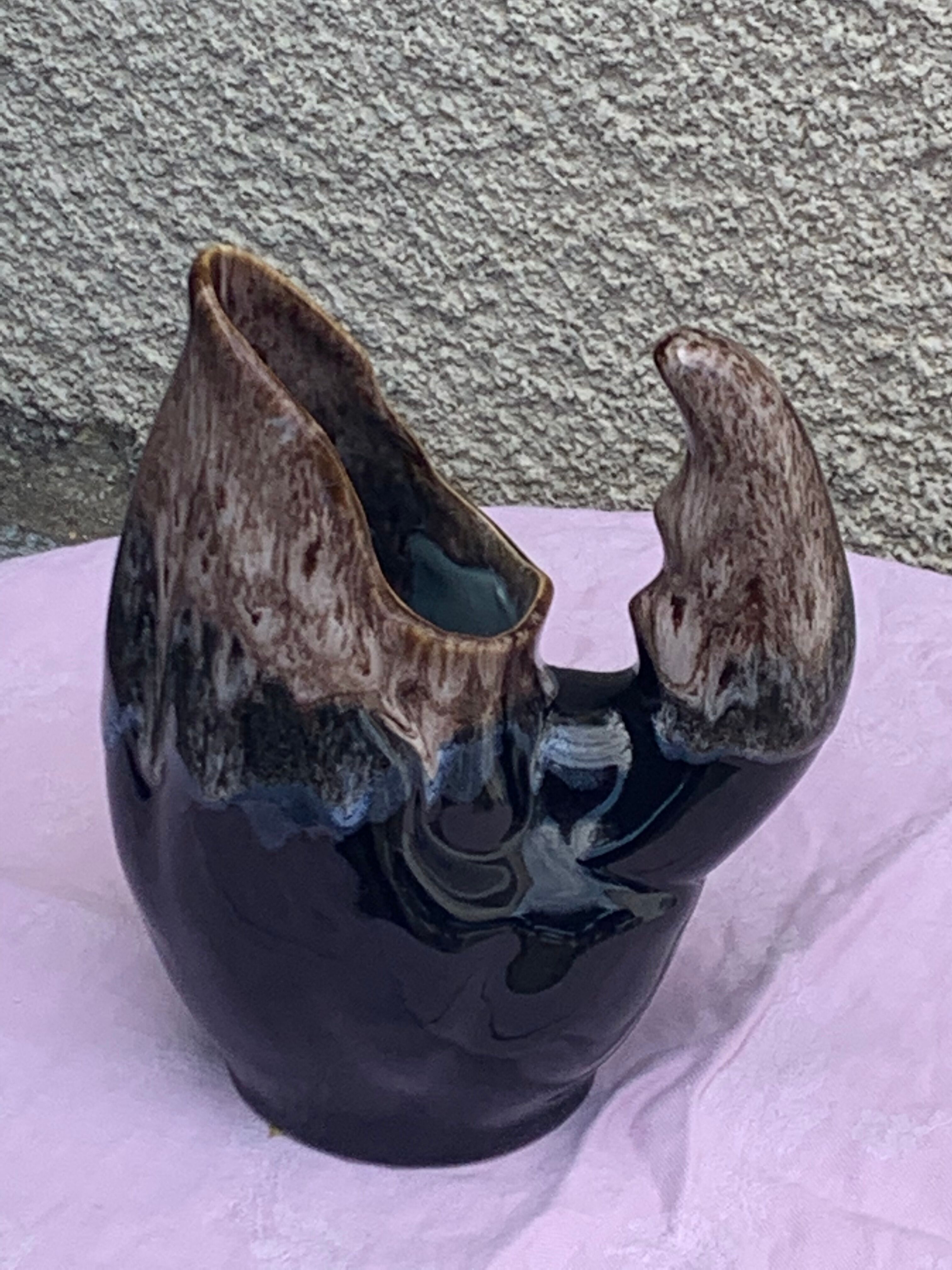 Vintage and numbered glazed ceramic decanter