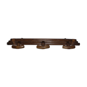 Leather and wood coat hanger