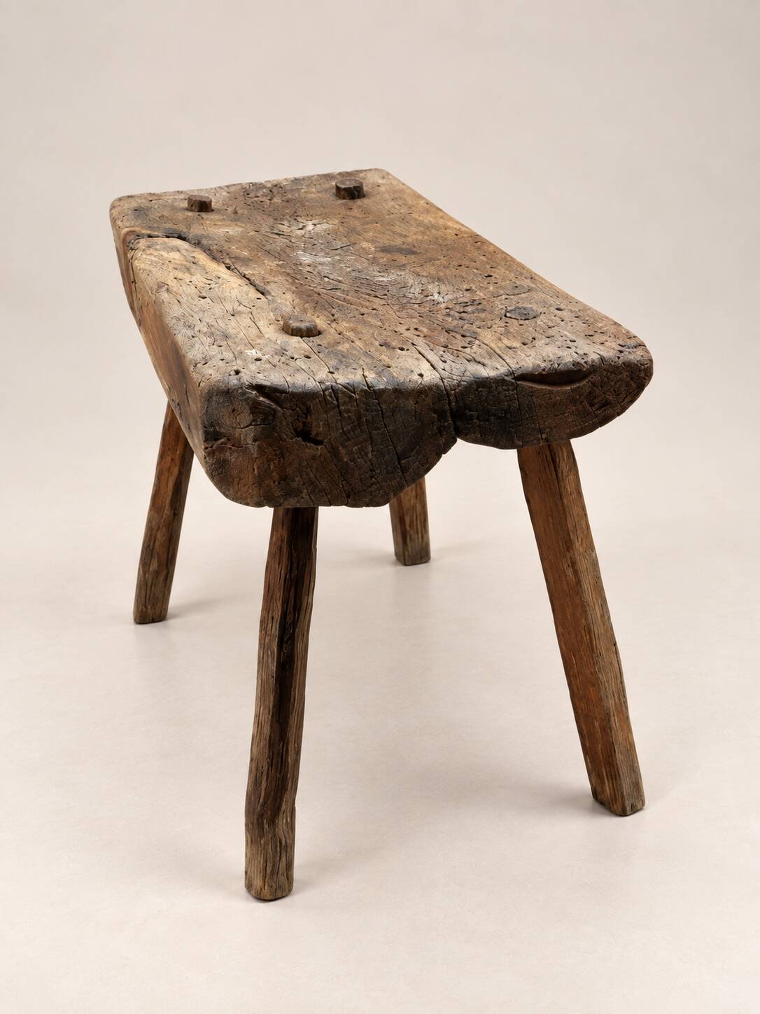 Old small bench / rustic stool made of solid wood – folk art