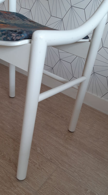White Baumann chair.