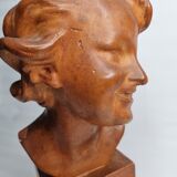 Bust of a laughing child in patinated plaster, 35 cm