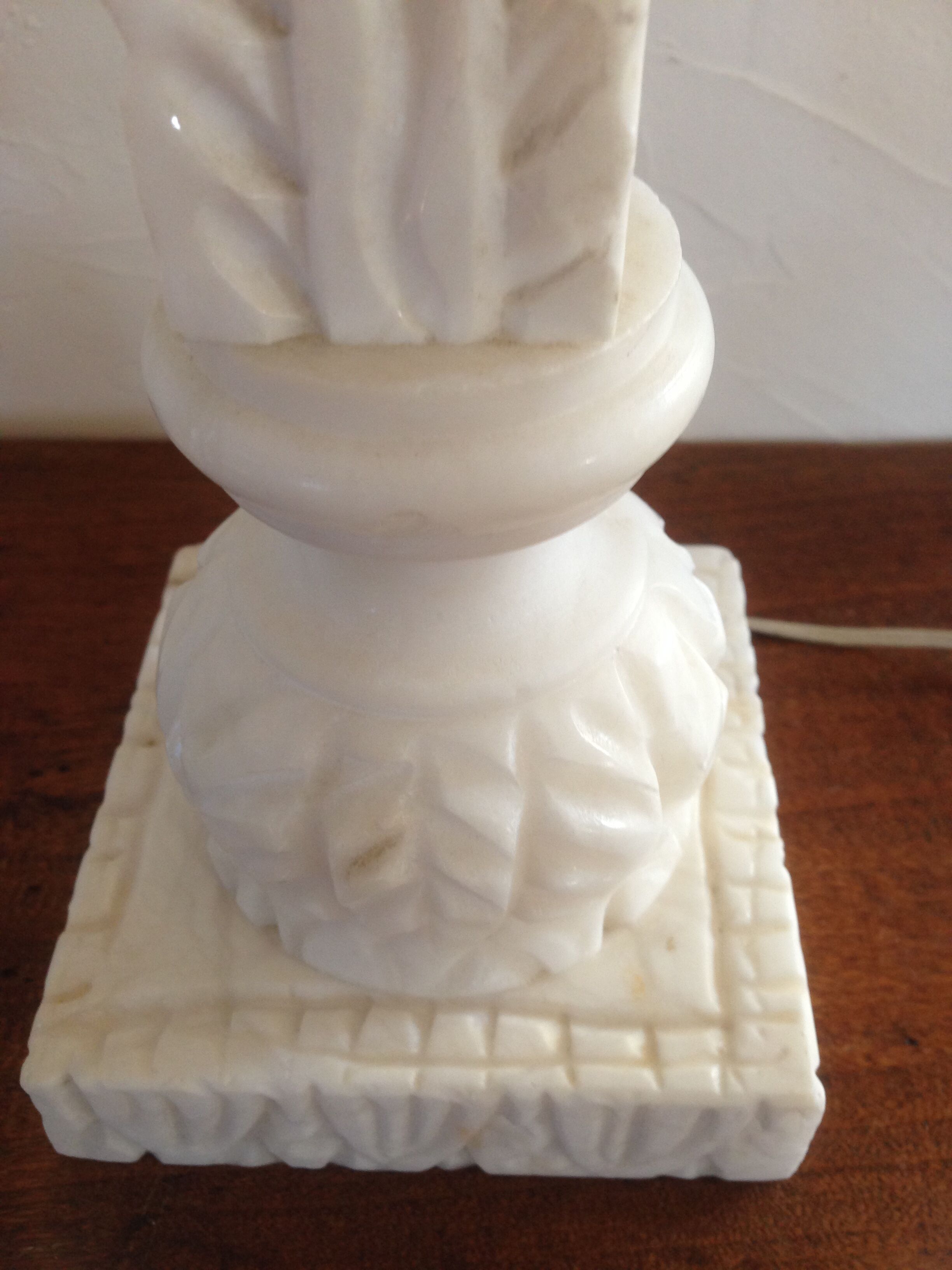 Feet of carved Alabaster column lamp