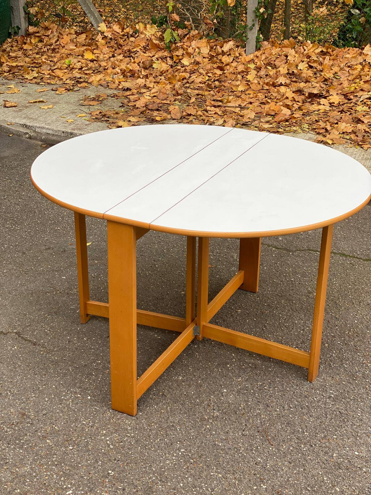 Vintage round folding Scandinavian dining table from the 1970s