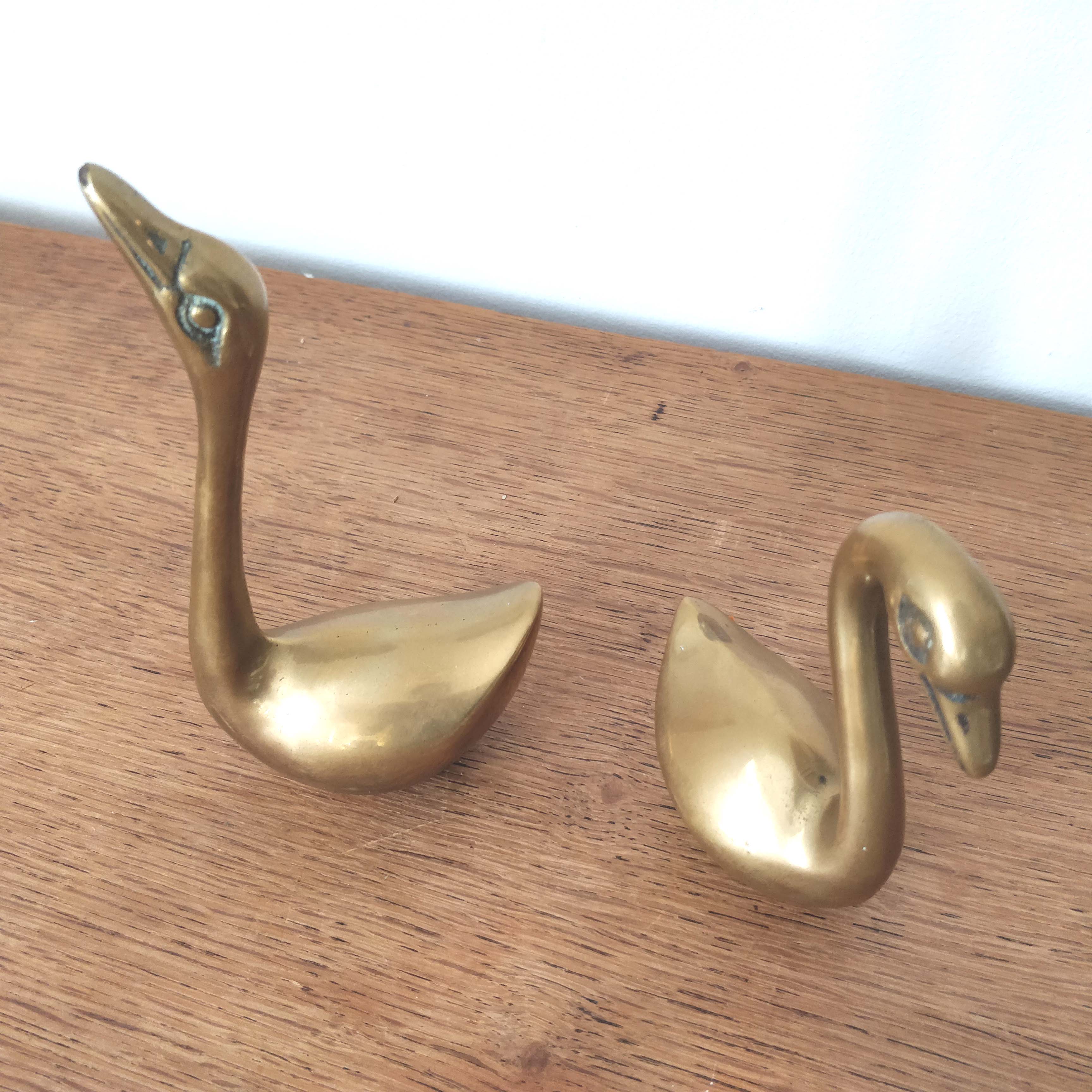 Couple of brass swans
