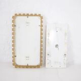 Large luminous acrylic mirror.