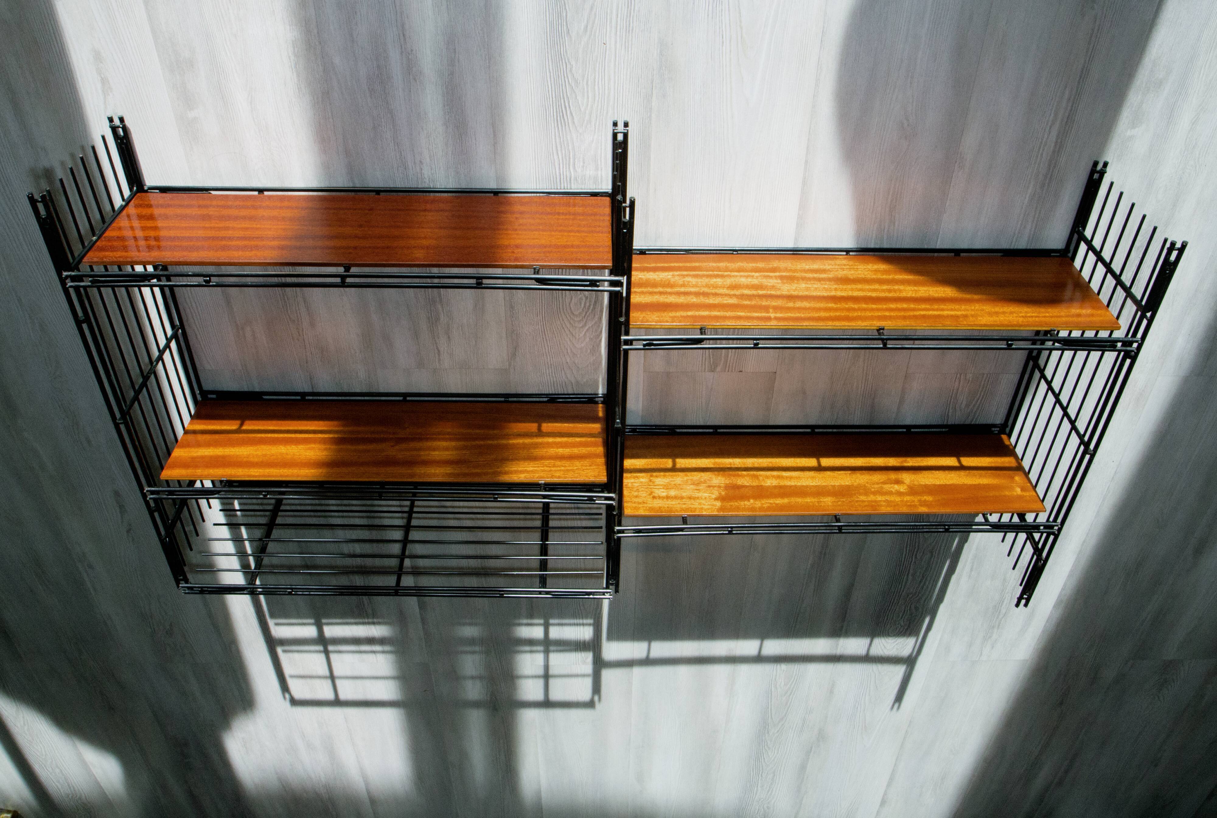 Modular shelves on wall or stand, published by Multimueble 1960