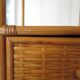 Storage column, wooden bookshelf and woven rattan.