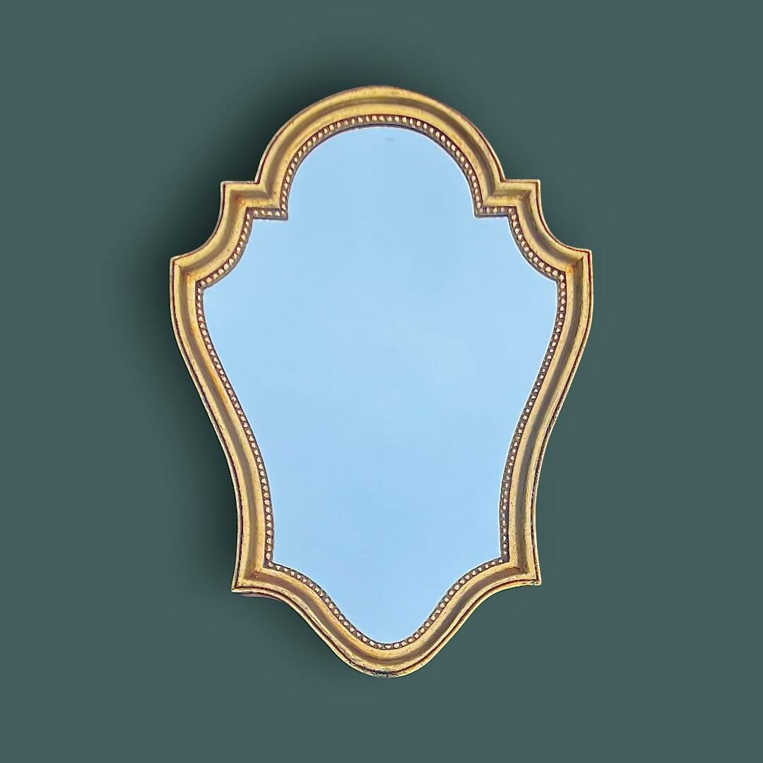 Antique mirror in gilded resin, shaped with curves – neoclassical style