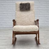 1970s, Danish rocking chair, reupholstered in quality genuine sheepskin.