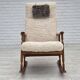 1970s, Danish rocking chair, reupholstered in quality genuine sheepskin.