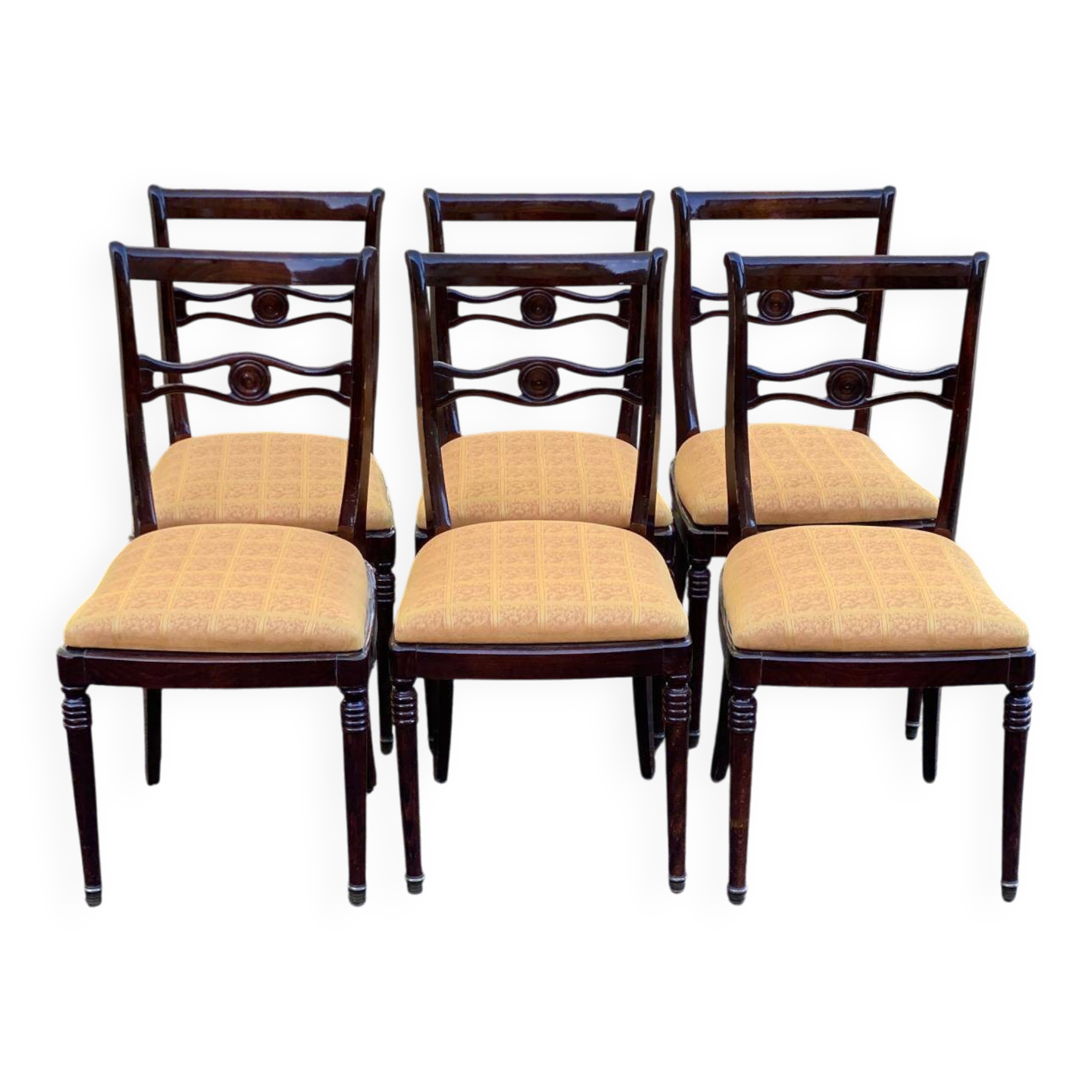 6 dining chairs made of solid mahogany in Regency style with yellow fabric.