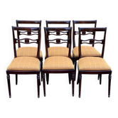 6 dining chairs made of solid mahogany in Regency style with yellow fabric.