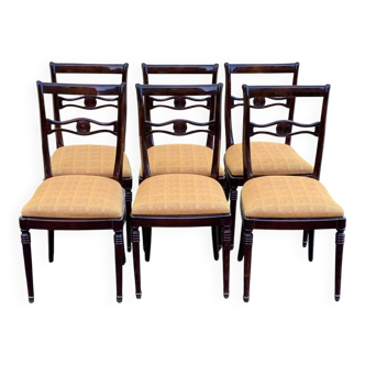 6 dining chairs made of solid mahogany in Regency style with yellow fabric.