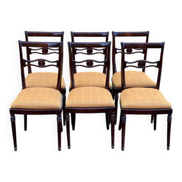 6 dining chairs made of solid mahogany in Regency style with yellow fabric.