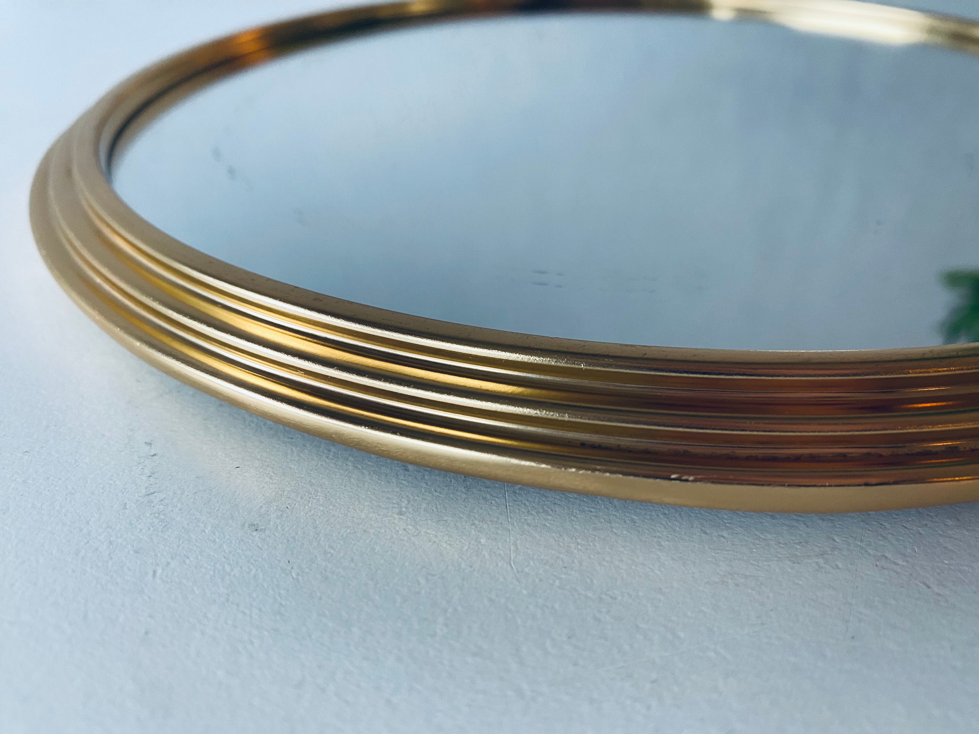 Vintage brass mirror