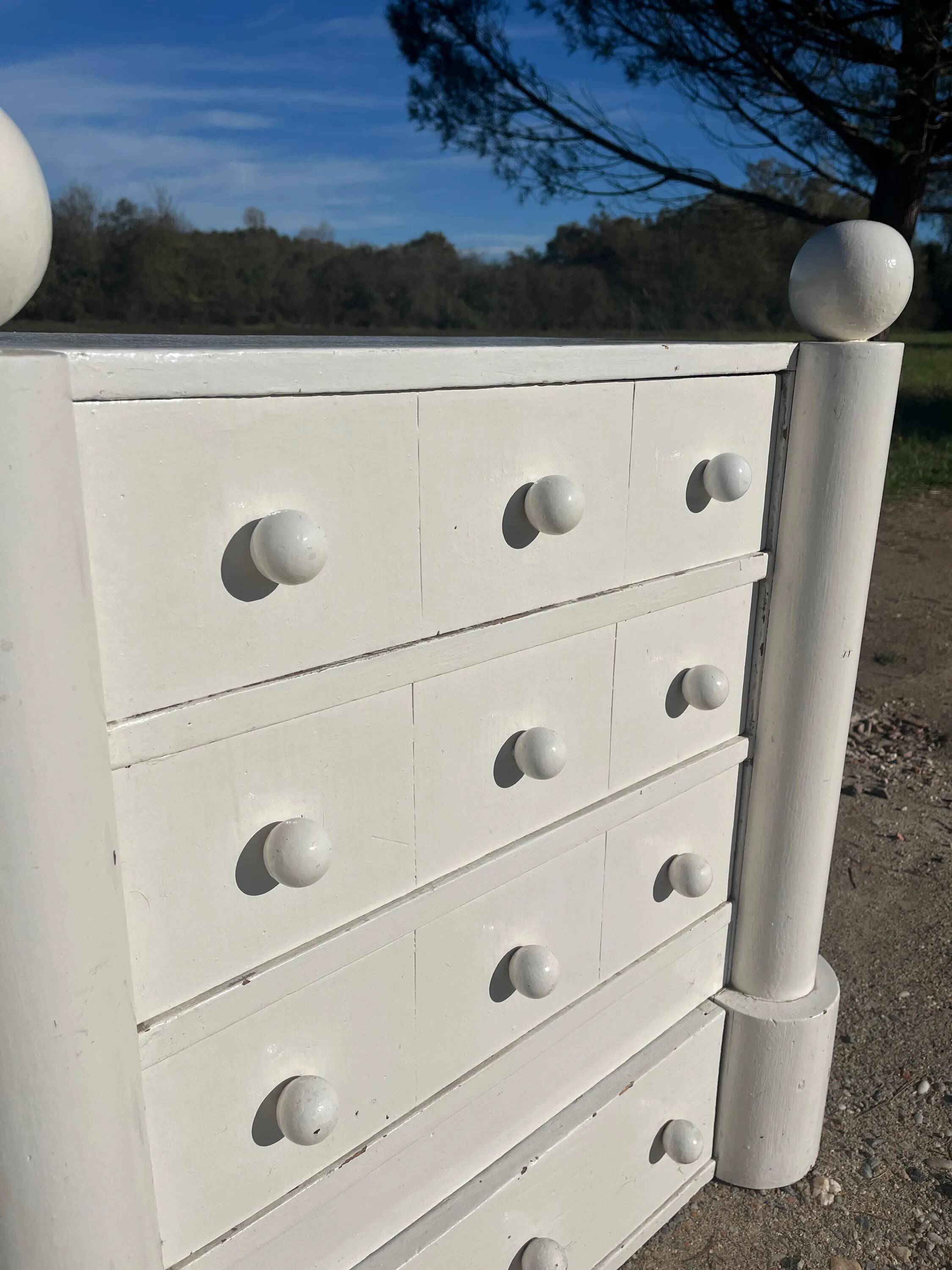 1950s lacquered wood chest of drawers