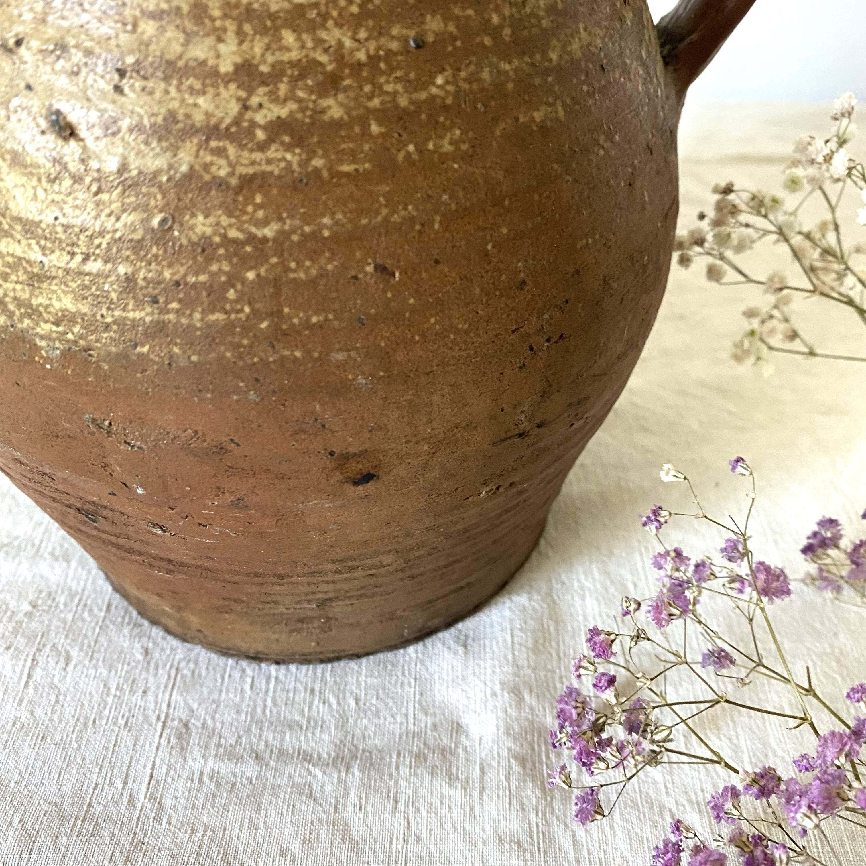 Antique terracotta pitcher