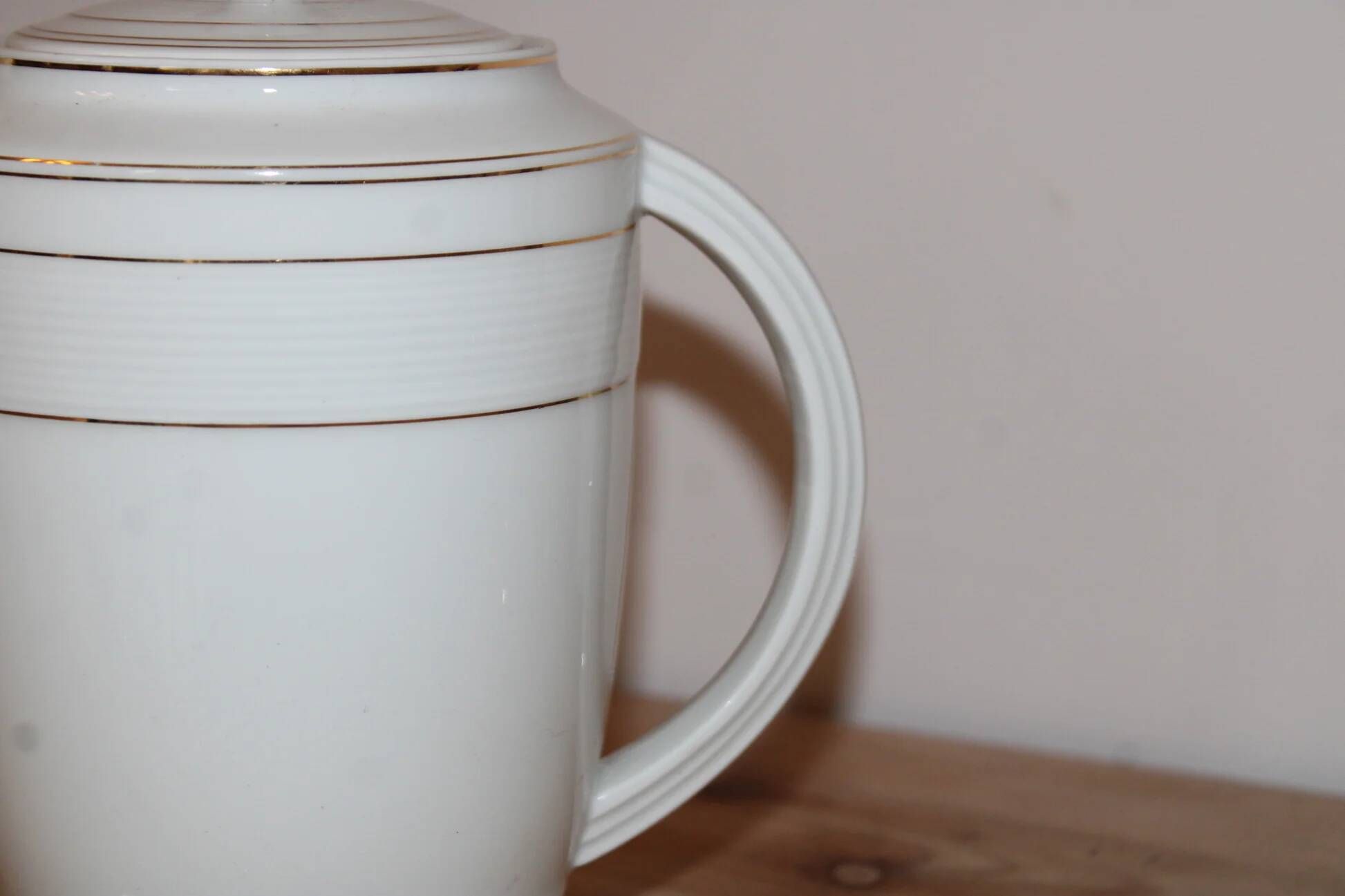 Vintage Art Deco coffee pot in Limoges porcelain by Charles Ahrenfeldt – gold trim.