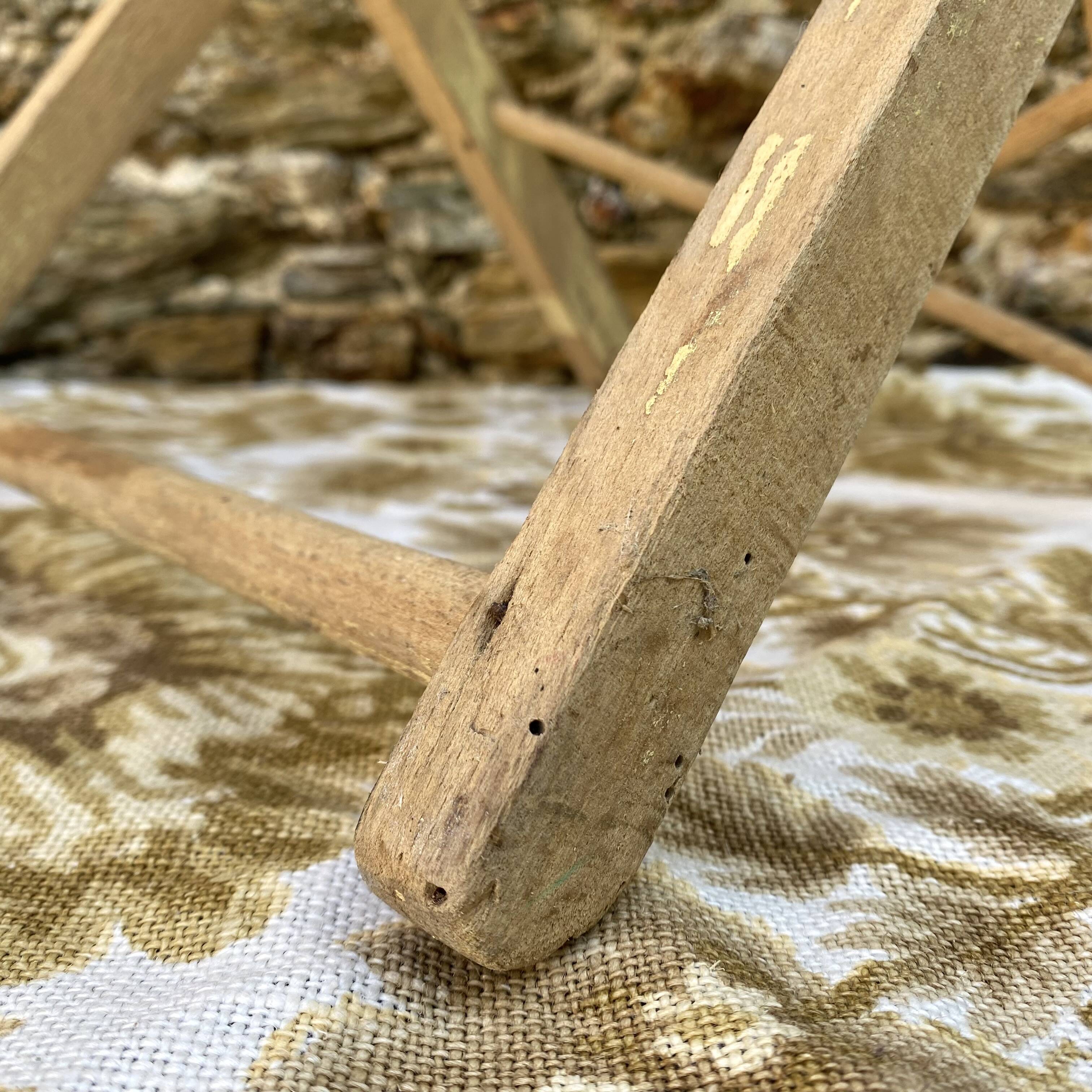 Antique folding chair with wooden slats