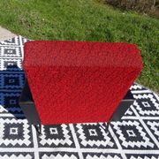 Pair of vintage armchairs in black faux leather and red fabric.