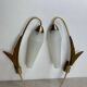 Pair of wall lights in brass, wood and opaline glass, 1950s/60s