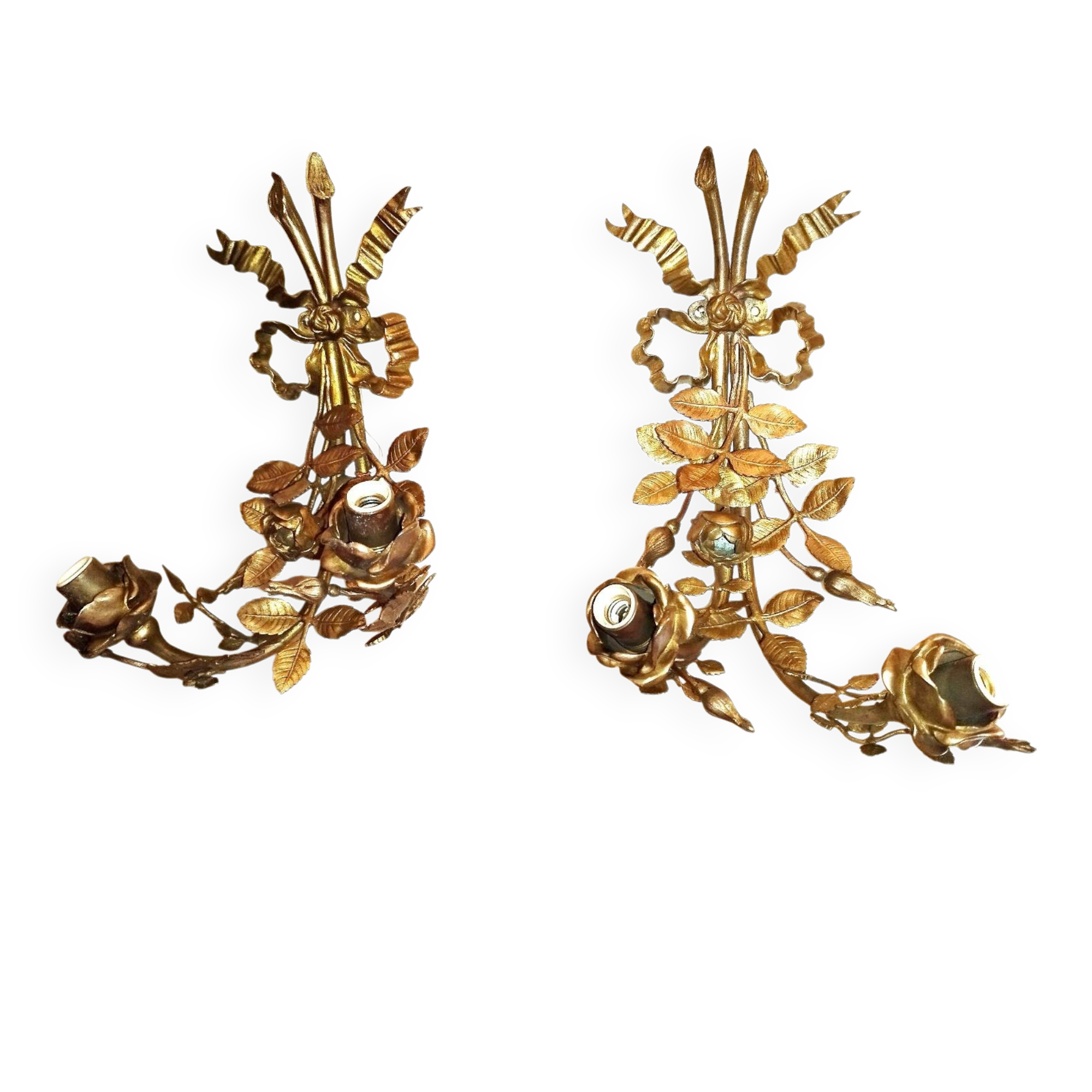 Pair of bronze and gilded metal wall sconces in the Louis XVI style.
