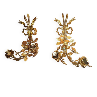 Pair of bronze and gilded metal wall sconces in the Louis XVI style.